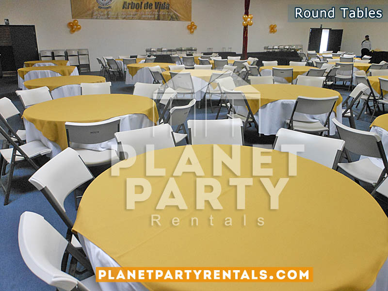 White Plastic Round Tables with White Round Tablecloths and Yellow Overlay