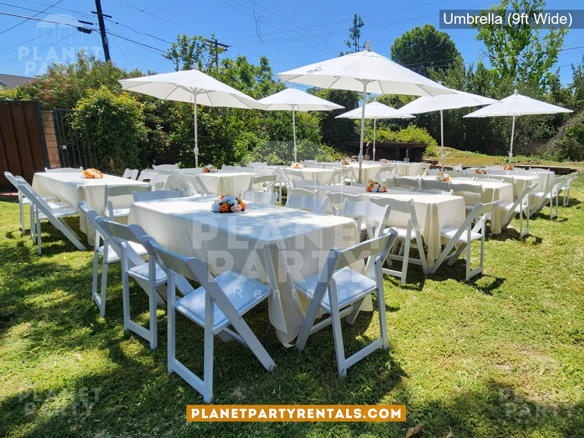 9ft Wide White Umbrella with rectangular tables and white wooden chairs