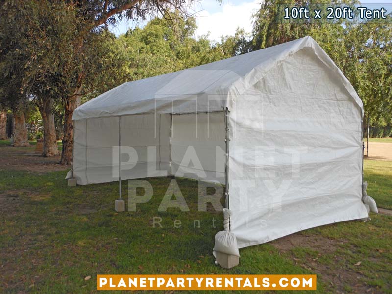 10x20 White Party Tent with white Sidepanels setup on Grass